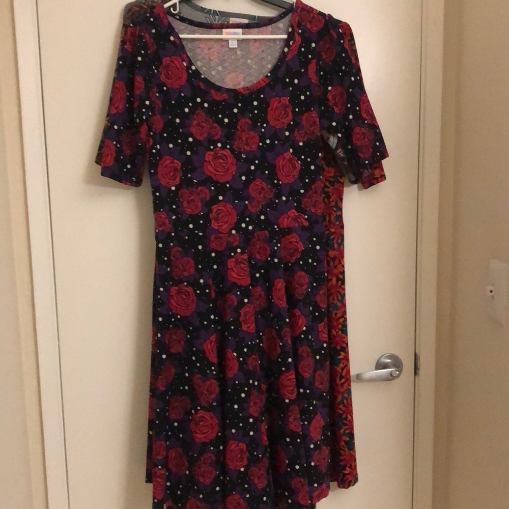 Red roses on white polka dot flattering dress